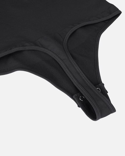 Glide zip thong tummy control bodysuit in black
