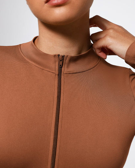 Glide zip thong tummy control bodysuit in black seamless shapewear NZ Caramel zip front